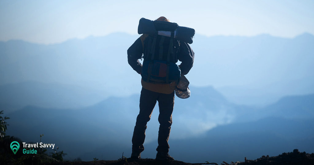 Person on a mountain background