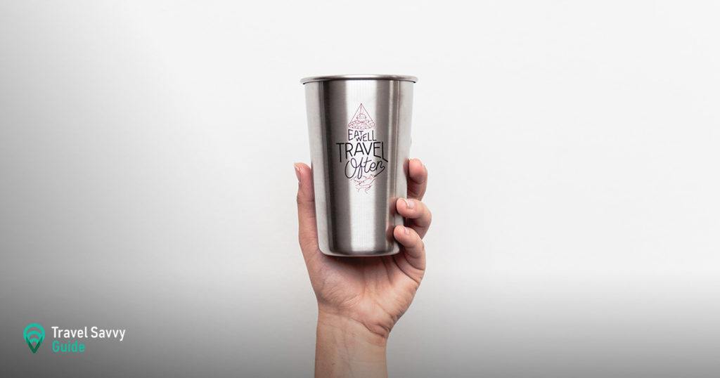 Metalic tumbler in hand