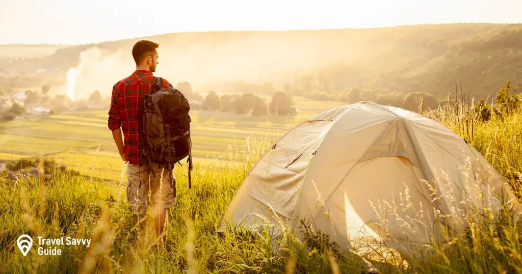 Front view man with tent