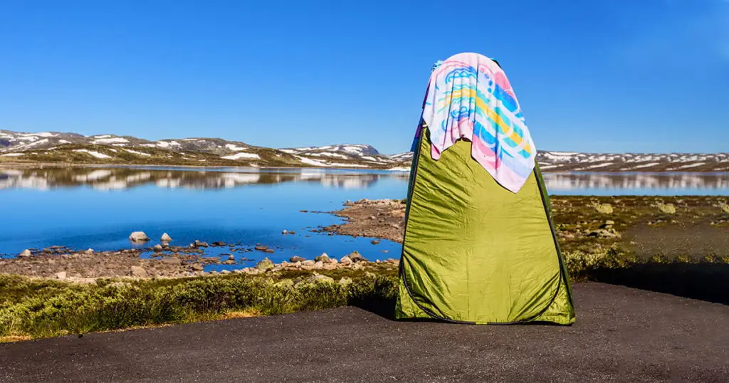 Portable shower bath tent on norwegian nature