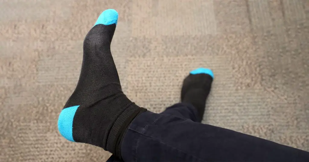 Background of Socks on Businessman Foot