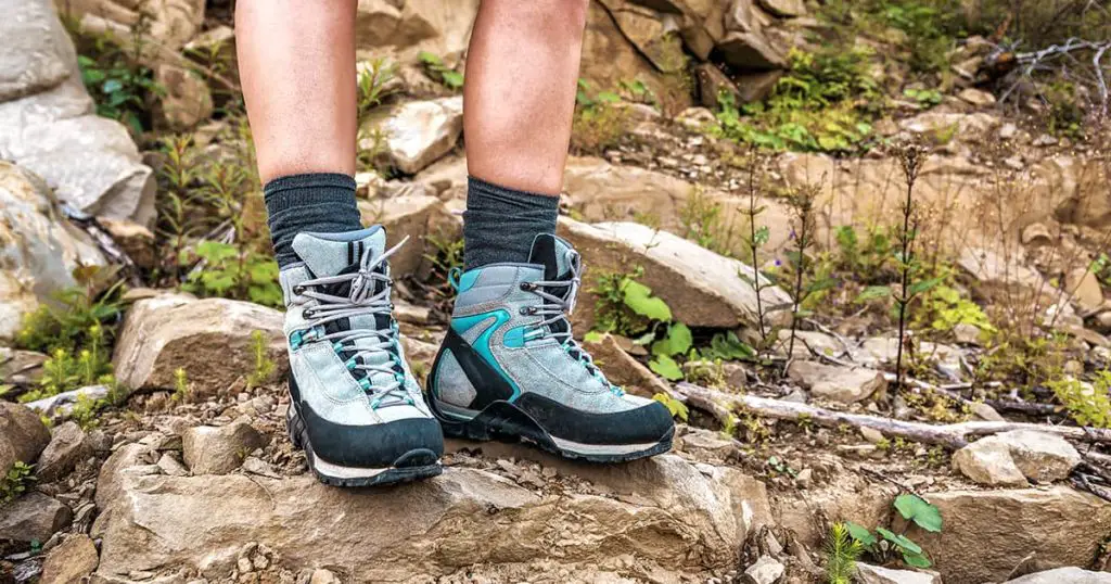 female legs in comfortable hiking boots