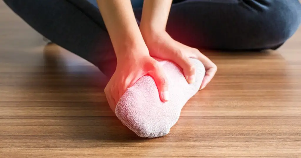 Women receiving feet massage and soles for plantar fasciitis,Foot pain