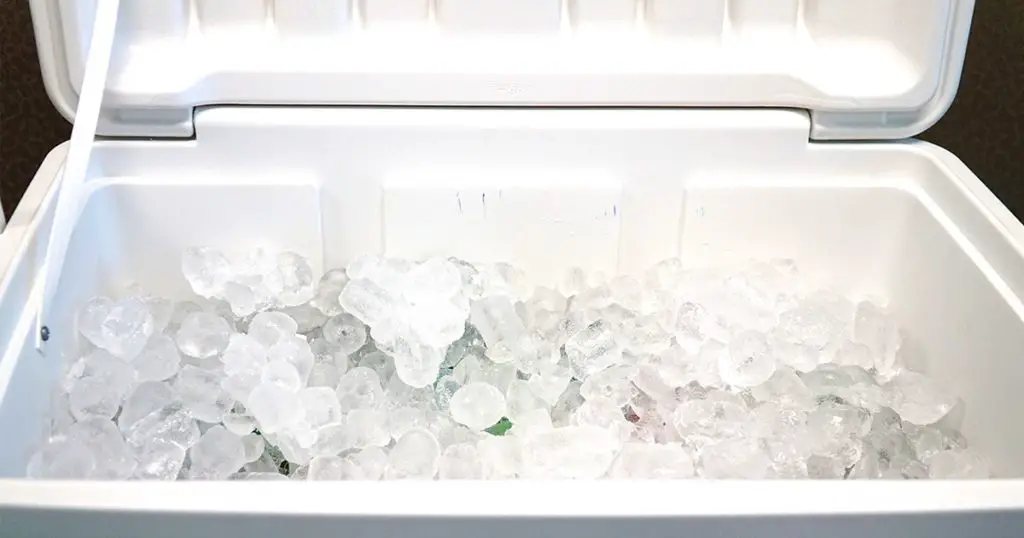 close up on ice inside cooler
