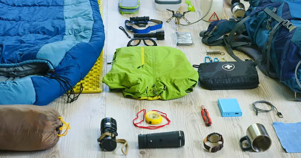 Things and accessories for trekking camping and travel, flat lay, top view set