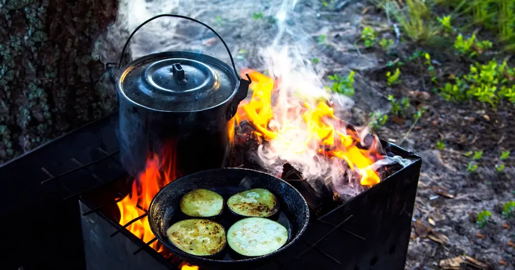 Cooking over an open fire in the forest