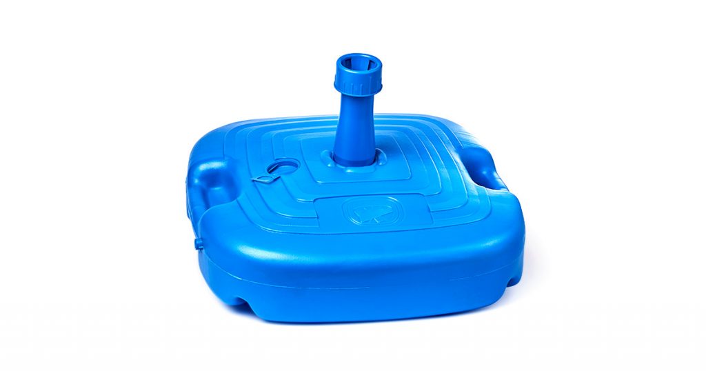 Isolated blue plastic umbrella base with clipping path