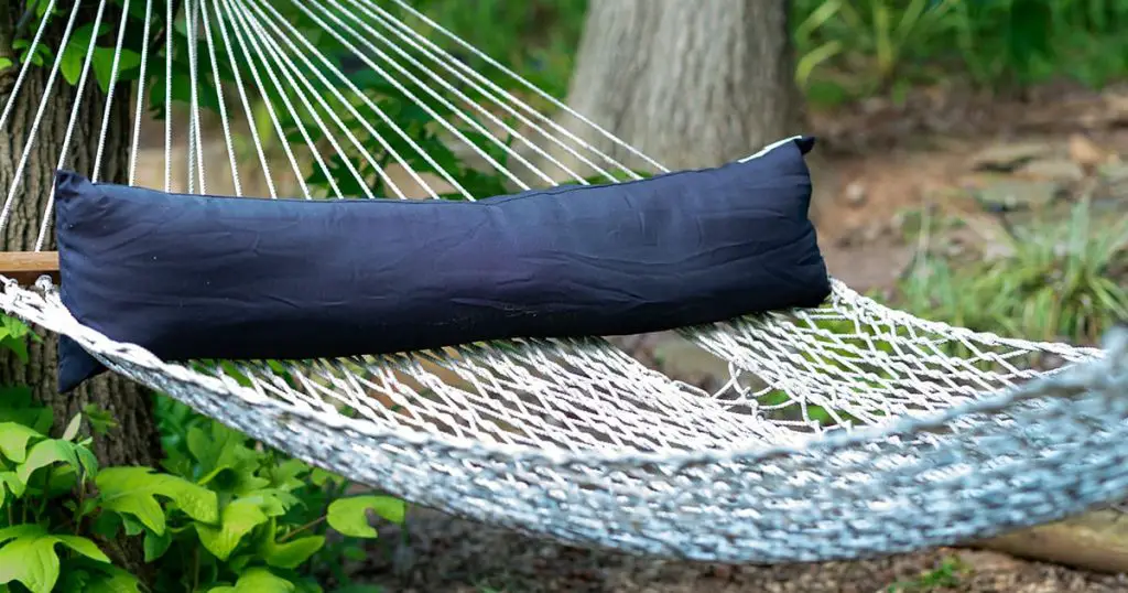 double wide wood reinforced white natural cotton fiber hammock and pillow for relaxation
