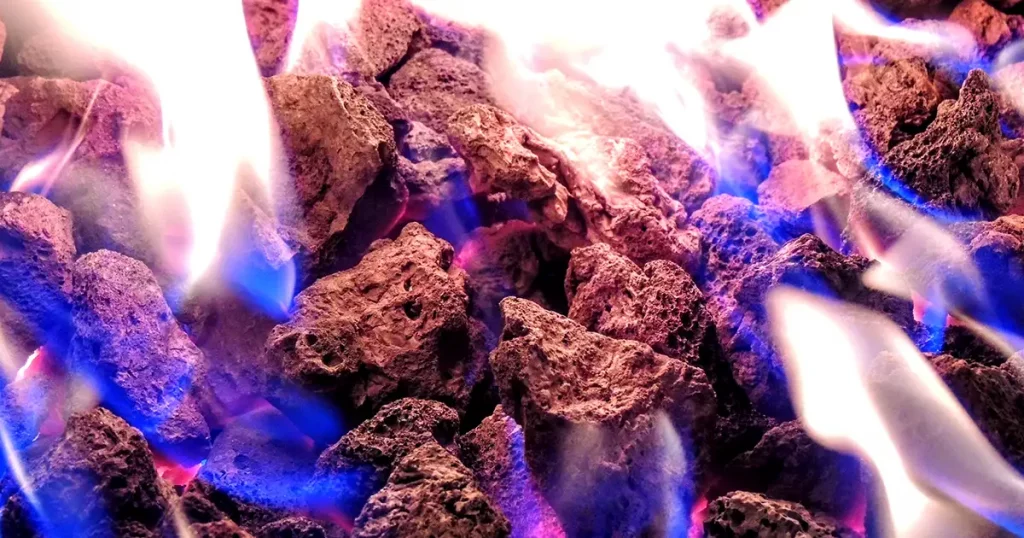 Artificial Fire pit propane flame in Lava Rocks