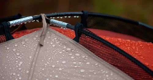 Water drops on the tent and tent poles after raining