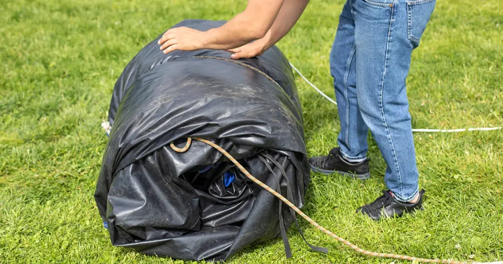 man twists the tent