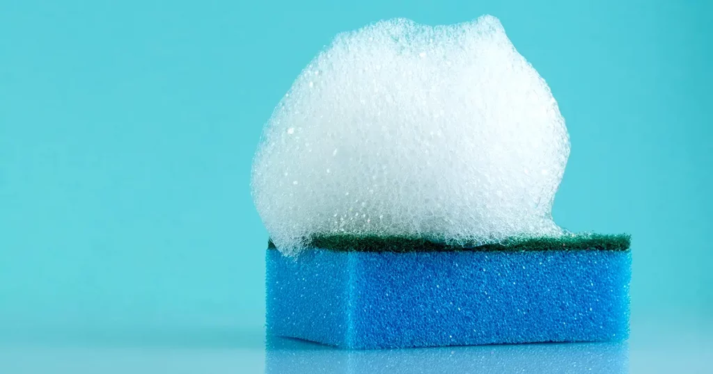 sponge, foam, bubbles, close-up, texture, light blue background