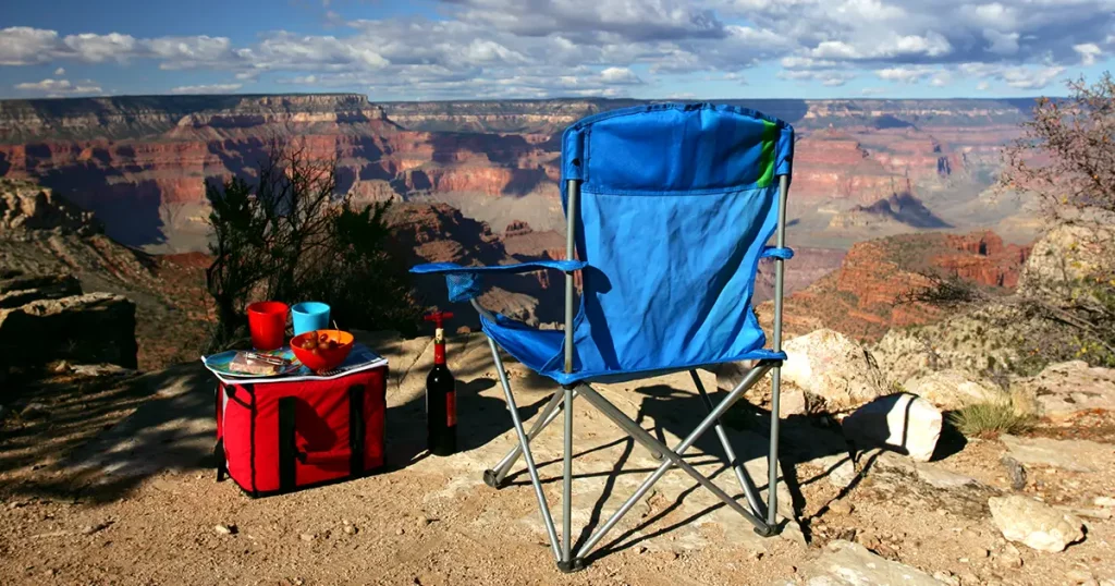 Folding chair and cooler on the edge of Grand Canyon