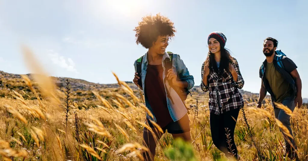 group-friends-on-country-walk-young