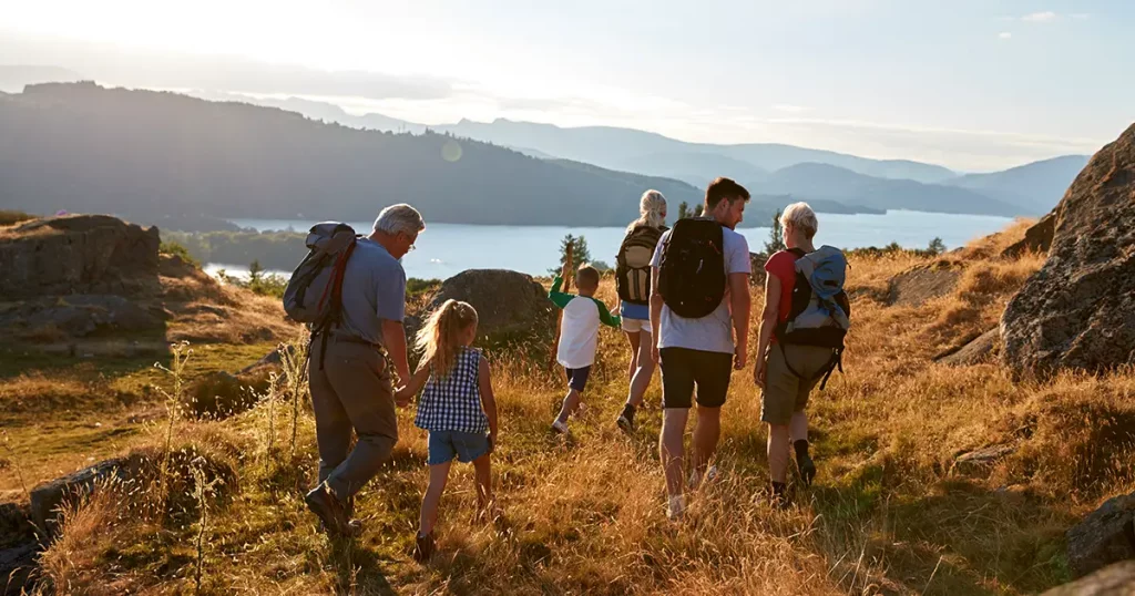 rear-view-multi-generation-family-hiking