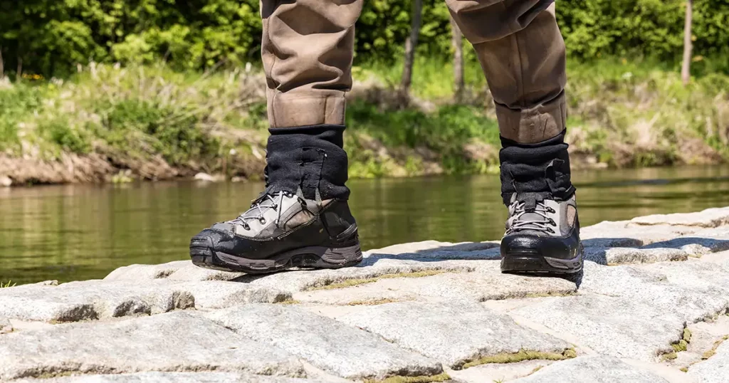 Fishing boots for wading in the river. Special fishing boots for fly fishing. Detail on shoes.