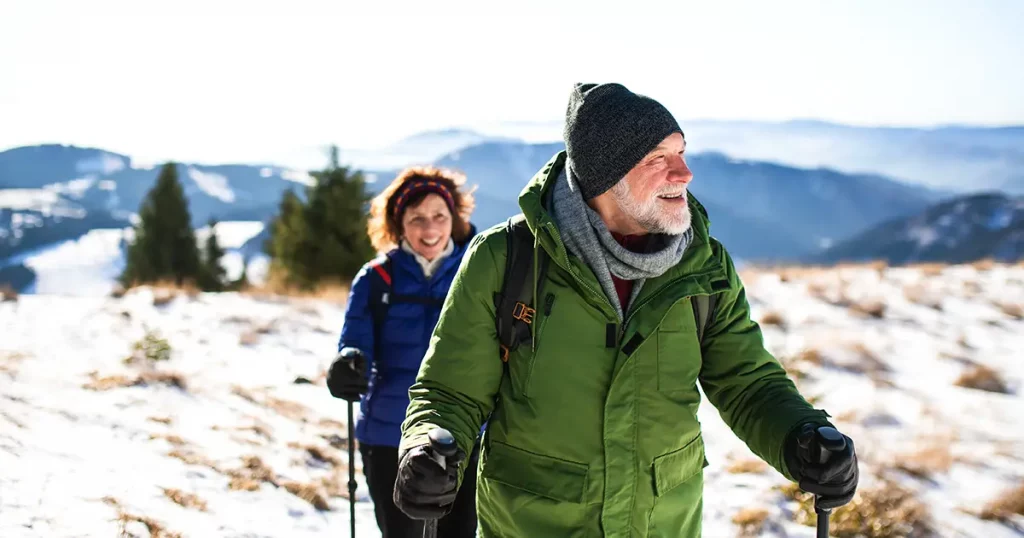 senior-couple-nordic-walking-poles-hiking