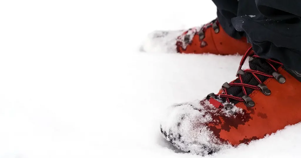 Hiking shoes on snow