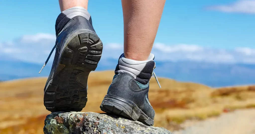 hiking boots on the rock in the mountains