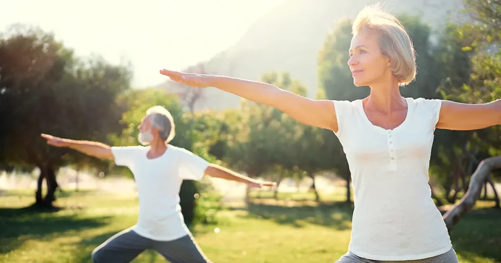 yoga-park-senior-family-couple-exercising