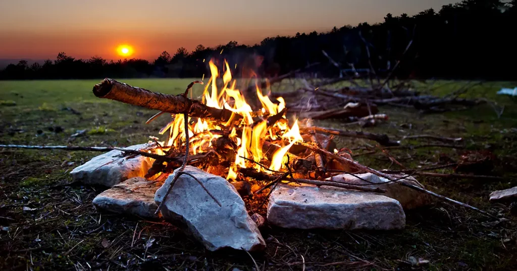 camping fire countryside