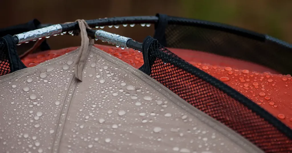 Water drops on the tent and tent poles after raining