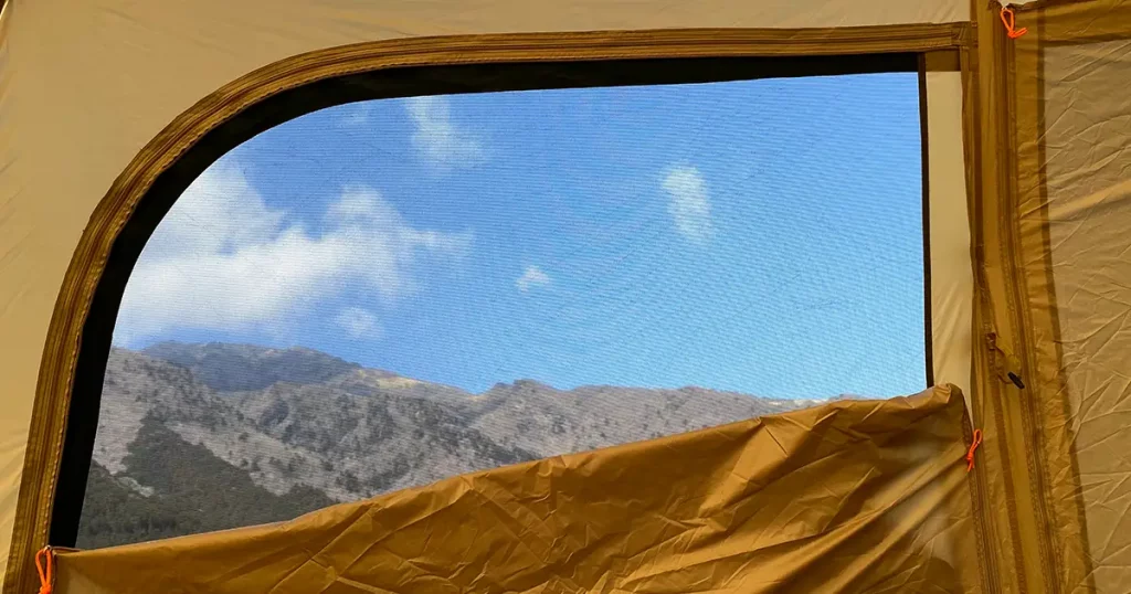 Mountain seen from the window of the tent