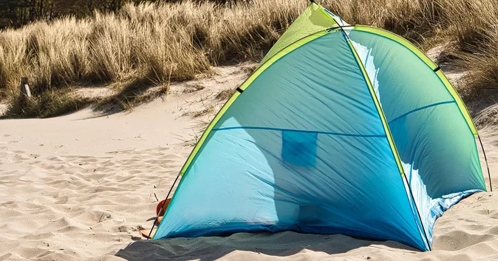 a tent for wind protection on the beach of the Baltic Sea in summer vacation