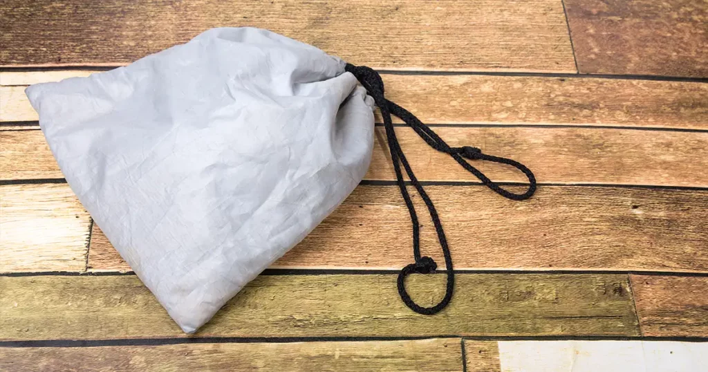 Waterproof bag on the wooden floor.