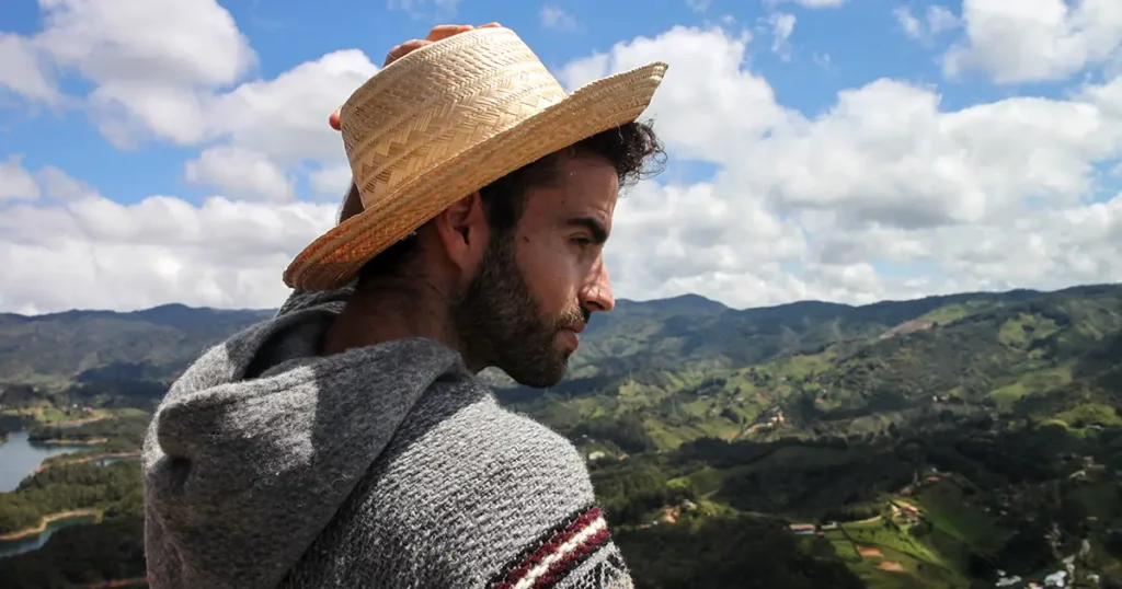 Young man dressed as a Chilean indigenous enjoying the spring breeze