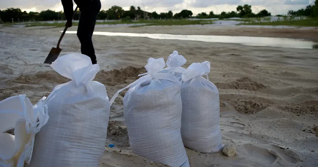 Gardens resident fills sandbags in preparation for Hurricane Dorian.