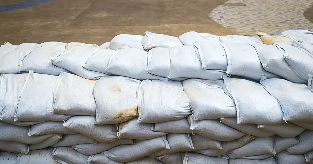 Sandbag to prevent flooding in the rainy season, preventive concept.