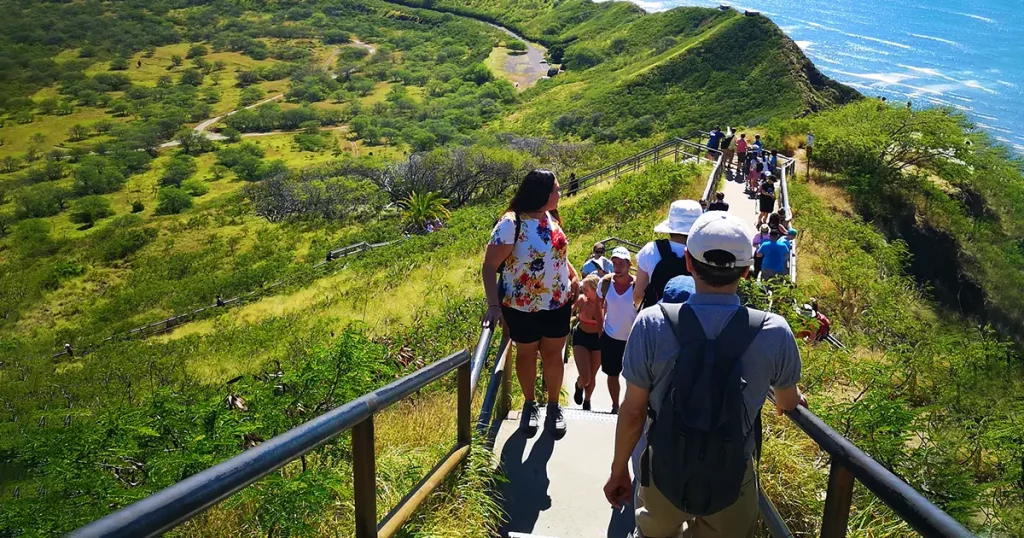 Tourists climing up to Diamond Head Trail, one of the best Oahu hikes