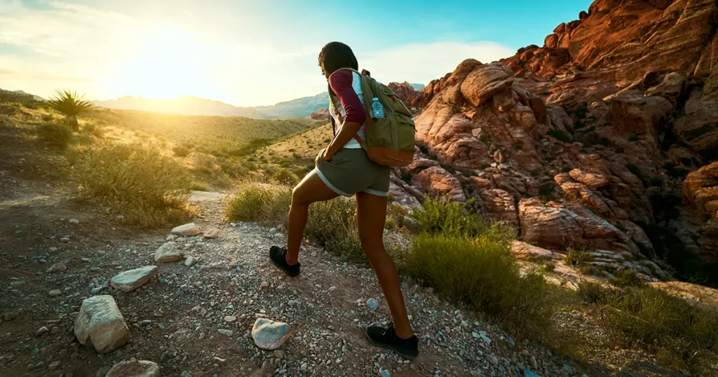 woman-hiking-red-rock-canyon-during