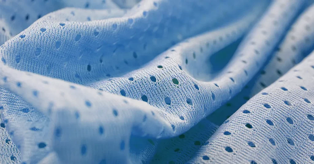 Blue mesh sport wear fabric textile pattern background