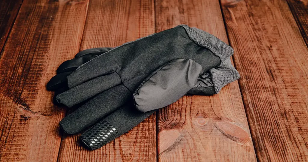 Winter gloves. The concept of skiing, proper clothing and preparation for winter sports